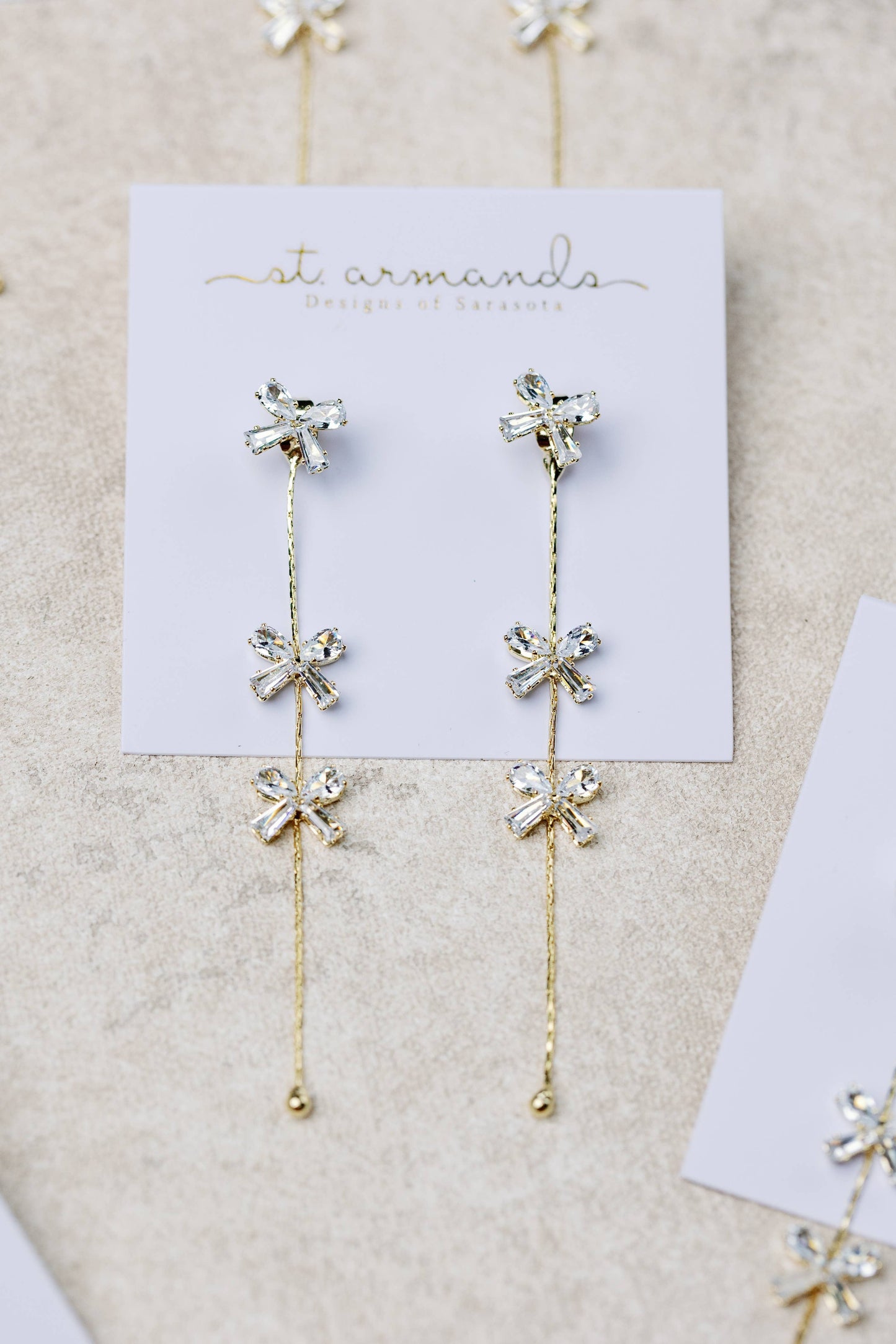 Diamond Bow Gold Duster Drop Earrings
