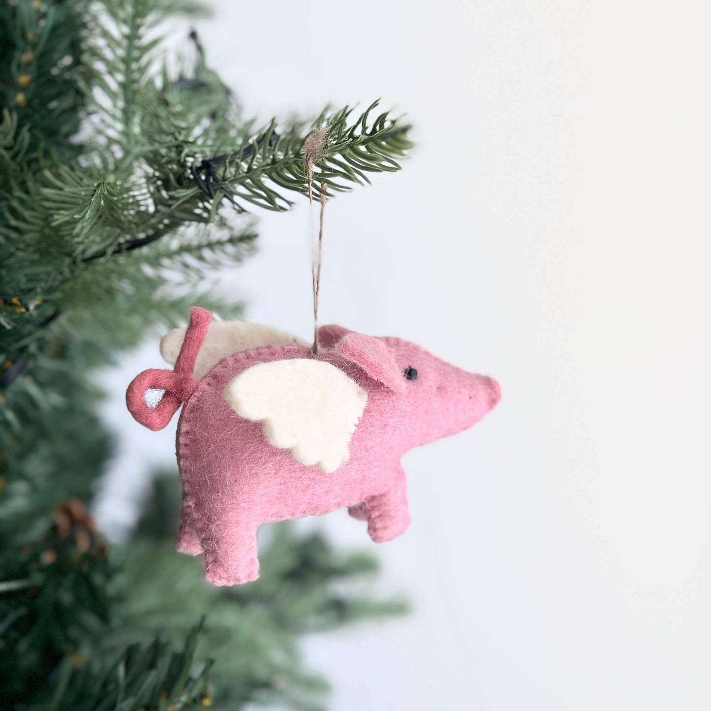 Felt flying pig ornament